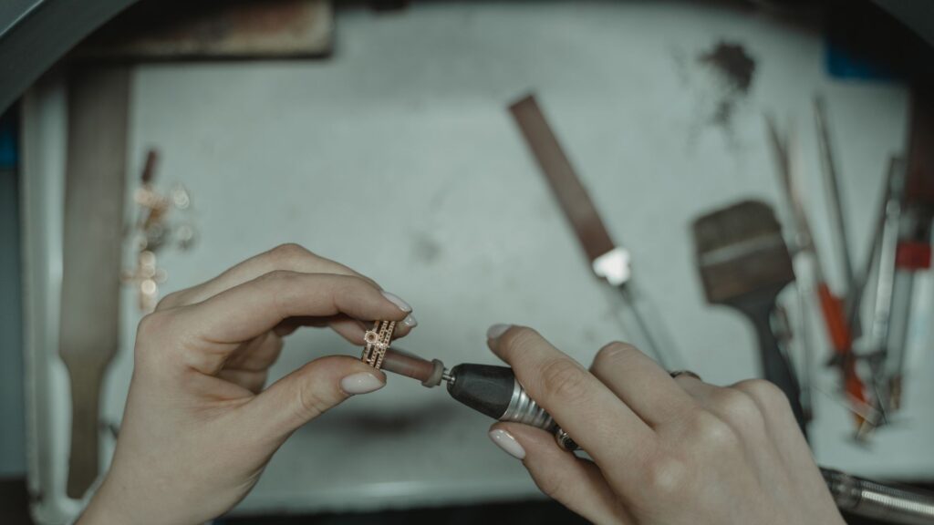Shot of a goldsmith and their client